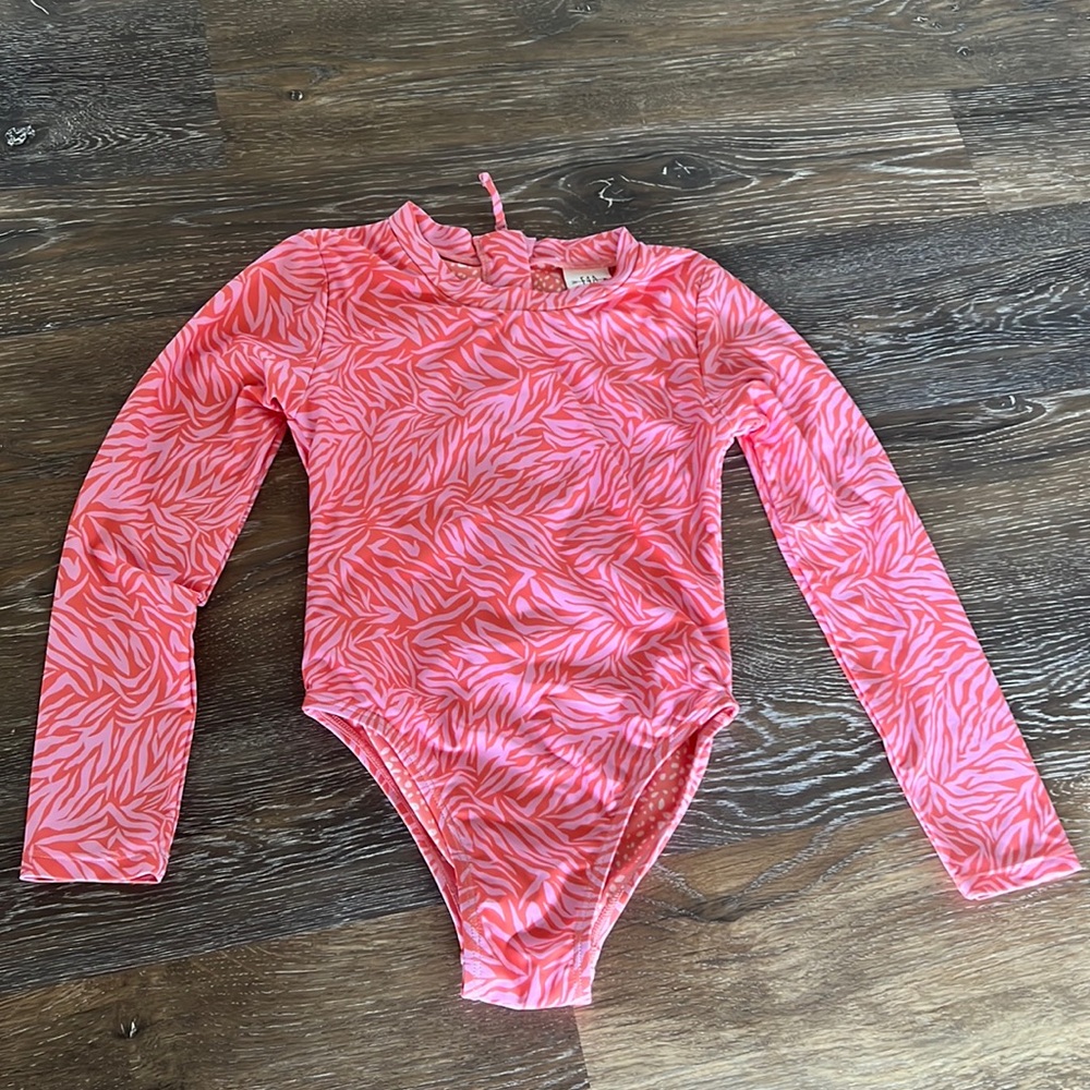 Girls one piece sun protection swimsuit.